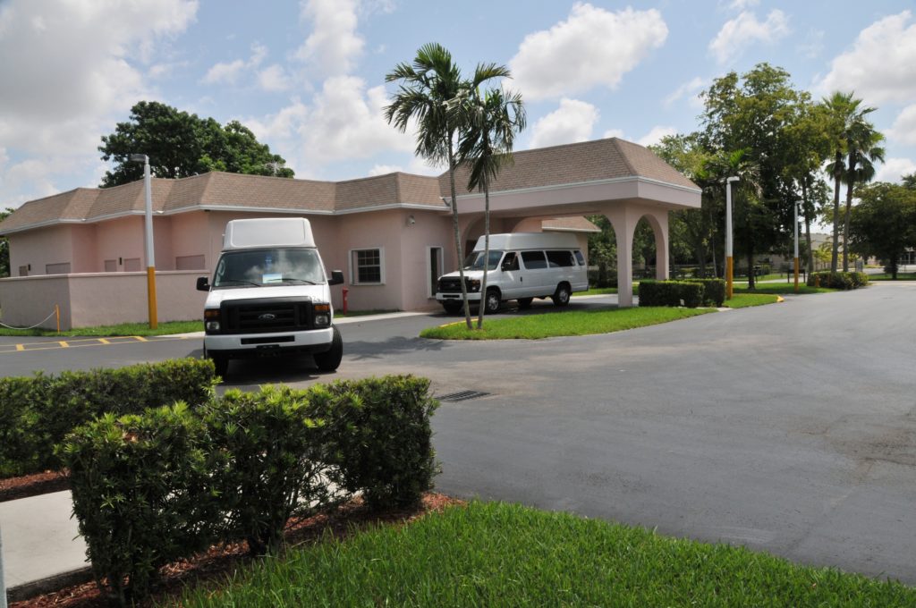 Vans In Front of House